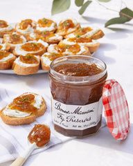 Bonne Maman fig preserves spread on toast beside cheese showing serving suggestion