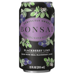 Bonsai can open pouring into glass with sparkling bubbles for refreshment