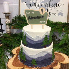 BOOMPA topper next to a ruler showing size and scale for cake compatibility