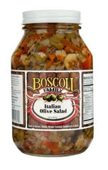 Boscoli Family olive salad spooned onto bread, adding bold muffuletta flavor