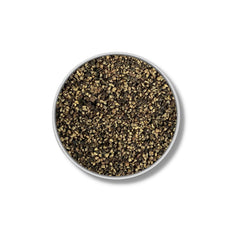 Bourbon Barrel Foods sprinkled on grilled steak showing smoky flavor enhancement