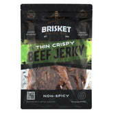 Brisket Chips Co. front packaging showing 8oz bag and branding, highlights convenience