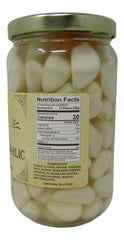 Close-up of pickled habanero garlic cloves highlighting crunchy texture and spicy flavor