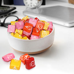 Buha Sweets pile of individually wrapped chews ready for party favor distribution