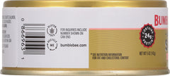 Bumble Bee salmon flaked over salad bowl, quick high-protein meal idea