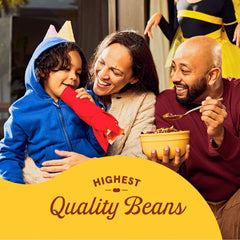 Bush's sauce pouring from spoon illustrating rich medium chili sauce