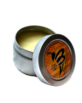 BuzzyWaxx front can open displaying label and secure quarter-turn lid for storage benefit