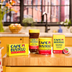 Café Bustelo espresso-style cup with steamed milk demonstrating how it stands up to milk