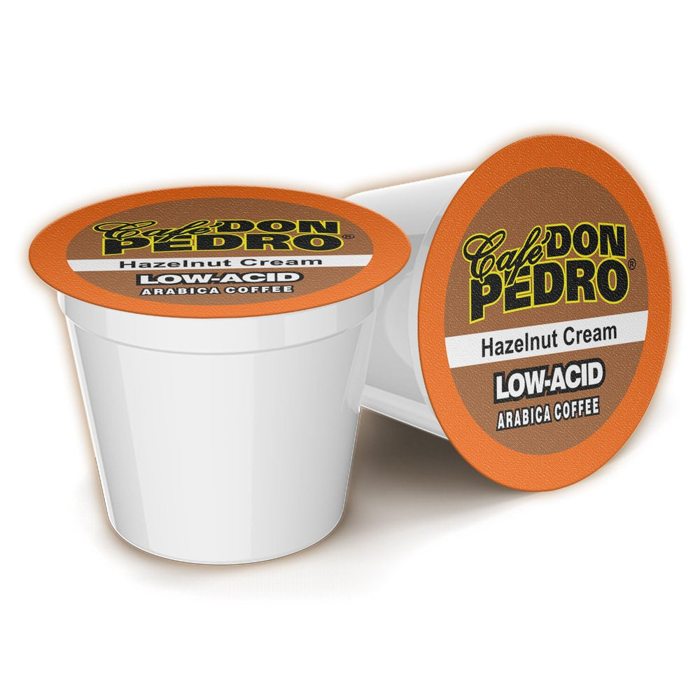 Cafe Don Pedro front packaging showing hazelnut pods and benefits
