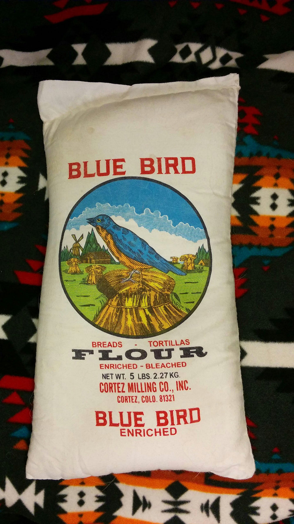 CAIKEZI Blue Bird Flour front cotton bag showing brand and eco-friendly packaging benefit