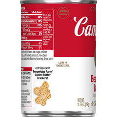 Hand holding Campbell's 11.25 oz can showing compact pantry-friendly size