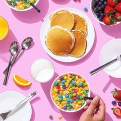 Cap'n Crunch colorful cereal pieces detail highlighting vibrant berry flavors and appeal
