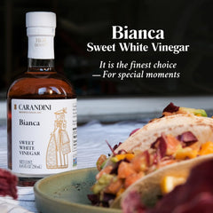 Carandini Bianca viscous texture on spoon illustrating syrup-like body benefit