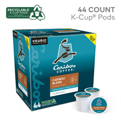 Caribou Coffee pod inserted in Keurig brewer producing a fresh cup quickly