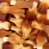 Ceres Gourmet front packaging of 2.2 lb cola bottle gummies showing brand and bag size for convenient sharing
