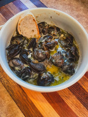 Chef's Quality drained escargots on a plate showing ready-to-cook convenience