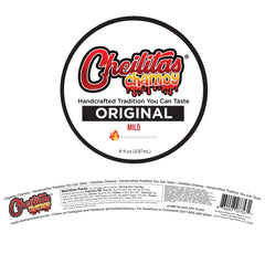 Cheilitas Chamoy drizzled over fresh fruit showing Cheilitas adding sweet-tart contrast