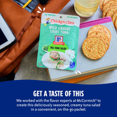 Chicken of the Sea tuna packet tucked inside a backpack for travel