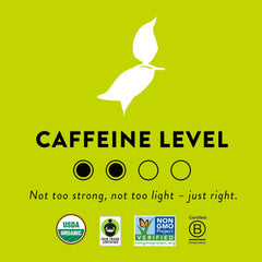 Choice Organic Teas brewed hot cup releasing floral aroma and steam