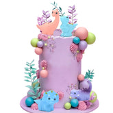 ChoJoy dinosaur toppers on cake showing party-ready decoration benefit