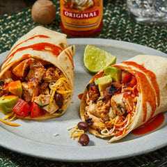 Cholula Original bottle top pouring sauce over food benefit controlled drizzle