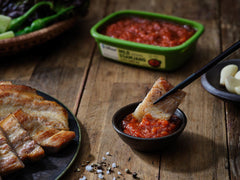 Chung Jung One served with lettuce wraps demonstrating easy dipping