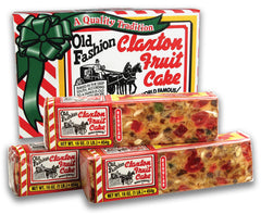 Claxton Fruit Cake front carton showing three 1 lb loaves and gift-ready design