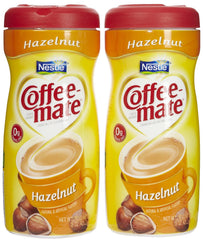 Coffee-mate front canister showing hazelnut label and clear flip-top for easy pouring