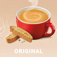 Coffee Mate being poured into a cup showing quick blending and creamy appearance