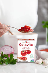 Colavita pouring diced tomatoes into a pan for fast cooking benefit