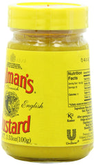 Colman's jar close-up showing smooth mustard texture and bold color for flavor