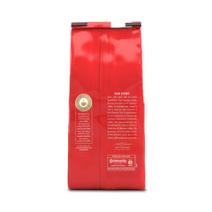 Community Coffee bag close-up label highlighting roast level and half-caff benefit
