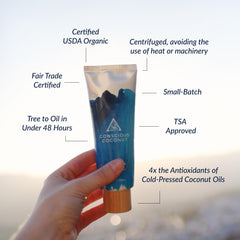 Conscious Coconut open cap and solid texture warming between fingers for easy use
