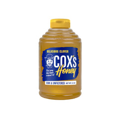 Cox's Honey 32 oz front label showing brand and purity benefit