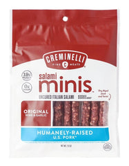 Creminelli salami minis sliced on a board with cheese for easy entertaining