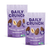 Daily Crunch front packaging showing cocoa and sea salt flavor, convenient two-pack benefit