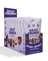 Daily Crunch front packaging showing cocoa sea salt flavor and 1.5 oz pouch benefit