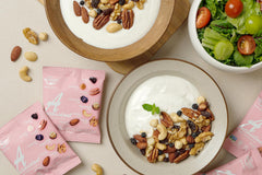 Daily Gourmet Nuts texture shot of dry-roasted almonds and cashews for crunch