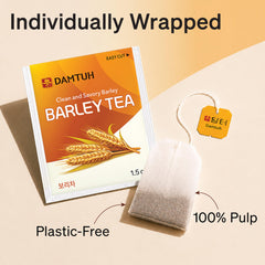 Damtuh iced barley tea in a glass with lemon showing crisp refreshment benefit