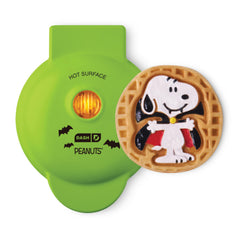 Dash Snoopy Vampire waffle maker front view showing green finish and compact design benefits