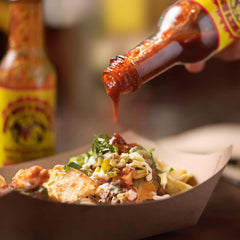 Dirty Dick's drizzled on wings adding bold tropical-sweet heat to appetizer