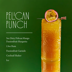 Dirty Pelican margarita poured in a glass with ice, ready to enjoy