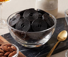 DM Sweets wheels in clear candy jar ideal for display and easy access