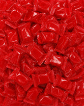 DM Sweets front packaging showing 1.5 lb bag and bold red discs, clear product view benefits convenience