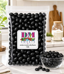 DM Sweets hand holding an extra-large jelly bean to show scale and generous bite size