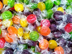 DM Sweets individually wrapped pieces piled to show hygienic, ready-to-serve convenience