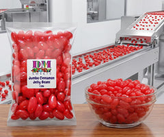 DM Sweets next to a standard jelly bean showing larger size and bigger chew