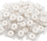 DM Sweets front of bag showing orange mints and branding, clear shelf-ready packaging benefit