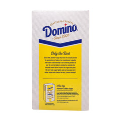 Domino sugar in measuring cup demonstrating accurate scooping for consistent baking