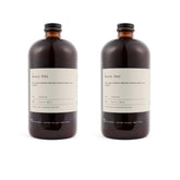 Dona Chai front packaging showing two 32oz bottles and brand clarity benefit